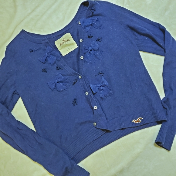 Hollister Sweaters - Blue Hollister cardigan with bows